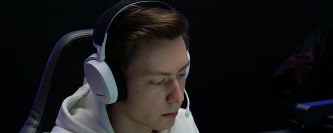 Meddo with headset on playing on stage